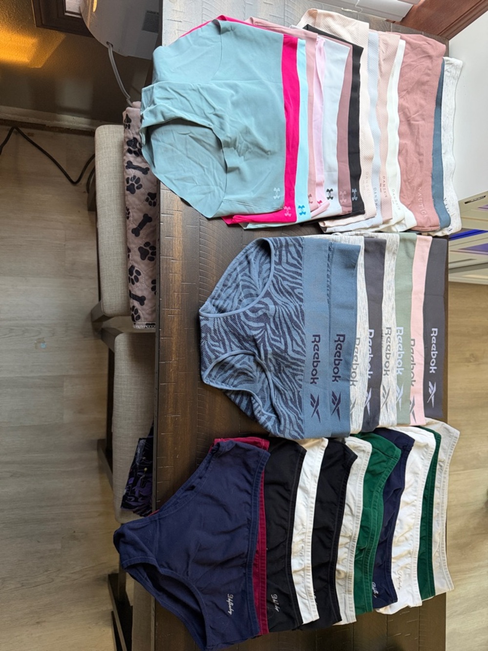 Reebok, under armour, danskins, nautica, and assorted women’s underwear. New